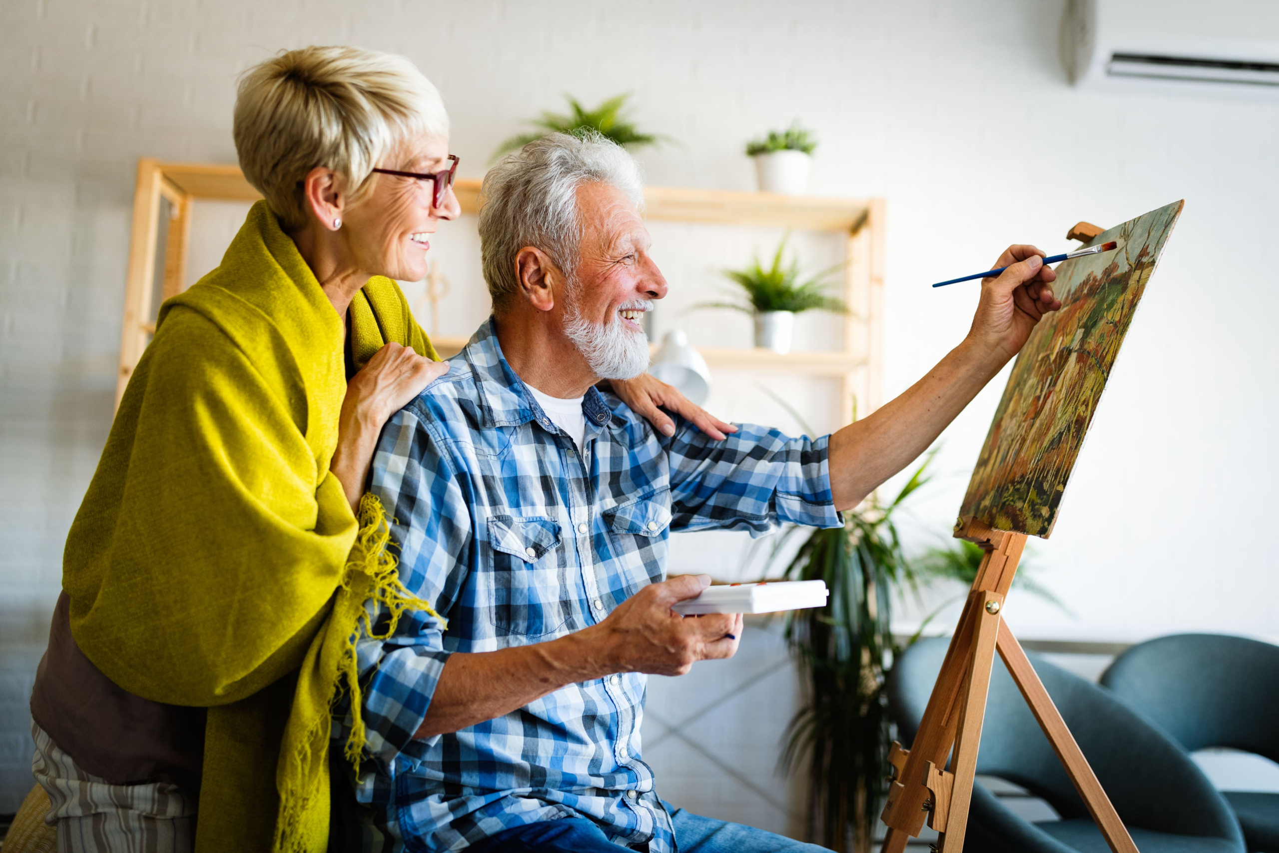 senior-couple-painting-together-in-their-home-2026-01-09-00-27-44-utc